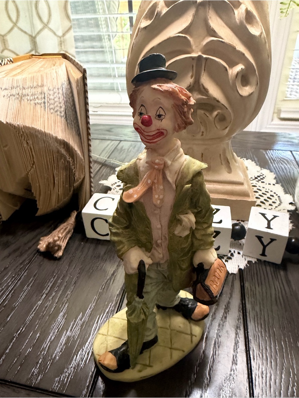 Vintage Price hobo banker clown figurine about 9 inches tall.